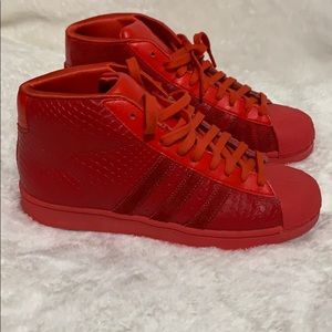 red adidas high tops mens